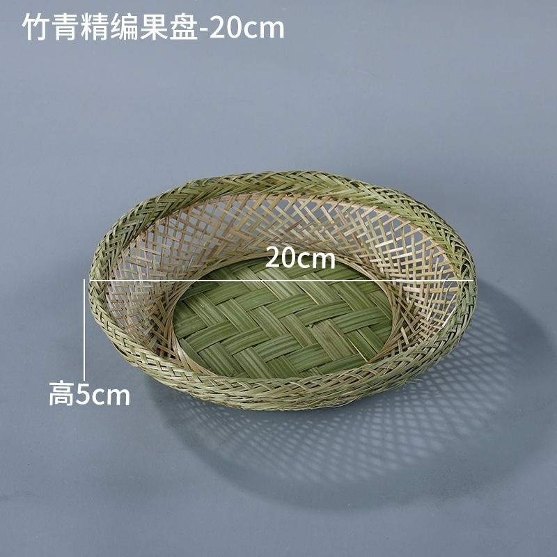 手作りの竹の編み製品の小さい竹のかごの丸い棚は箕のホテルのレストランの間食の果物のお菓子の皿のマントーのかごを振りかけます。|undefined
