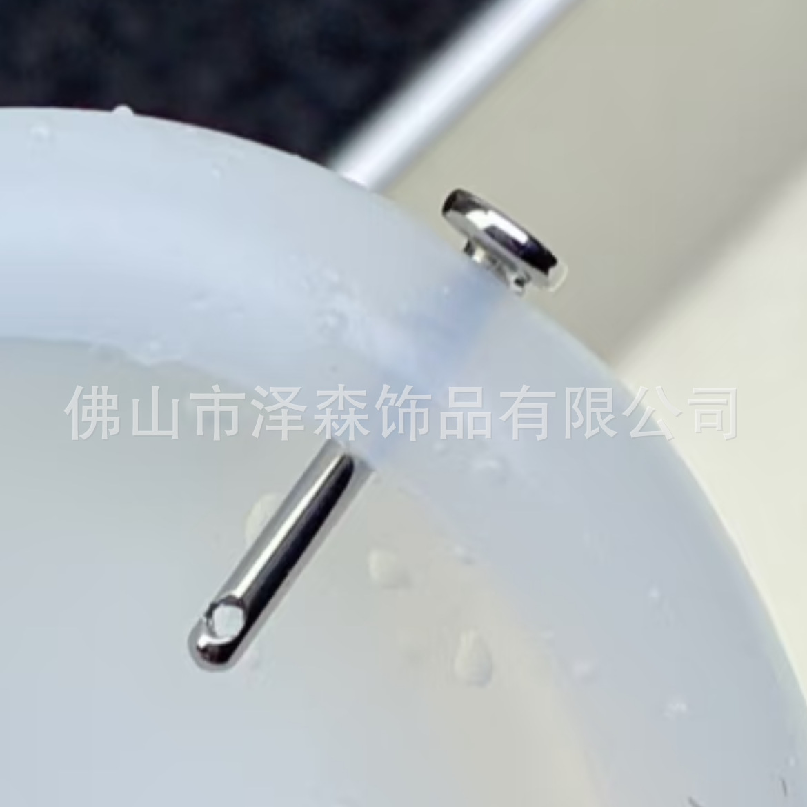 Silver pointed spike labret stud material detail