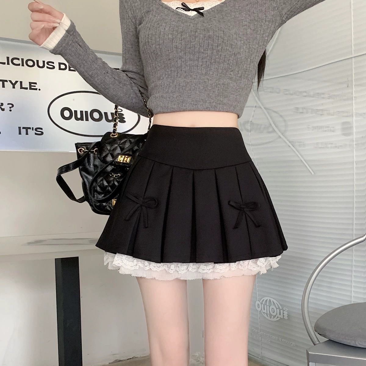 Плиссированные юбки женского пола весной и осенью Новый стиль с высокой талией и тонким кружевным бантом