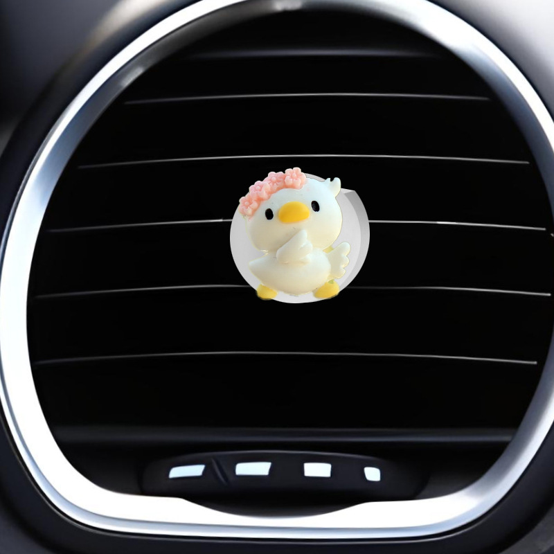 Clip de salida de aire de coche pequeño pato amarillo resina aromaterapia de coche perfume de coche adornos de dibujos animados accesorios de decoración suministros de coche