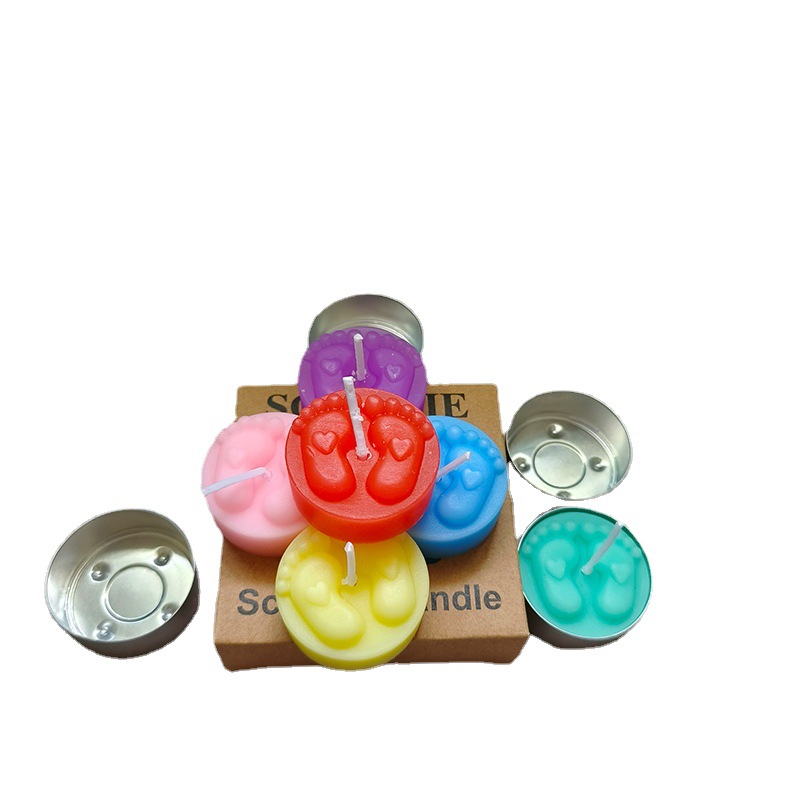 Fábrica en stock suministro redondo pequeña vela color aromaterapia pequeños pies vela atmósfera cumpleaños que deseen vela