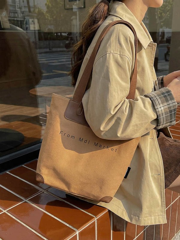 Bolsa de lona coreana hollow-wind casual bolso de mano para mujeres 2026 nueva bolsa de hombro casual simple y lujosa