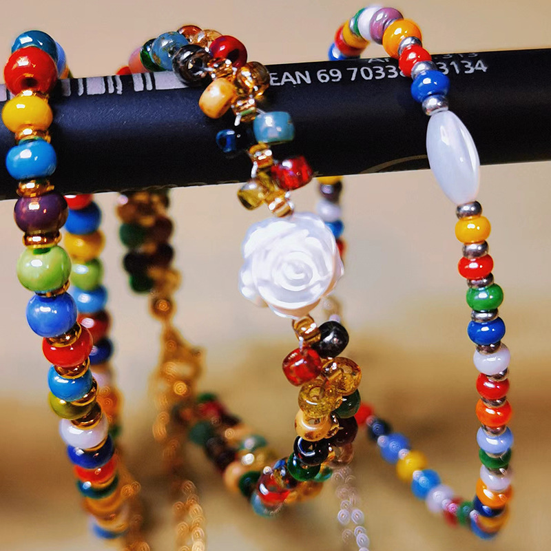 Checo Baosha importación de perlas de arroz transparentes multicolores hechas a mano DIY accesorios de brazalete perlas de vidrio sueltas