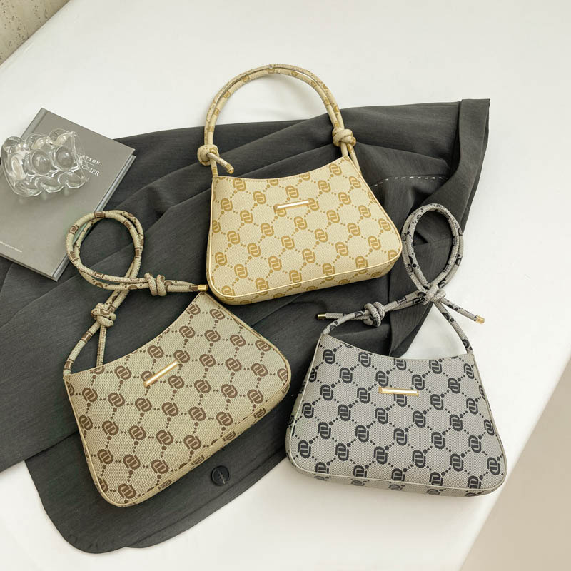 2025 nuevo nicho de verano diseño de letras metálicas retro viejas flores bolsos de hombro bolsos de mujer