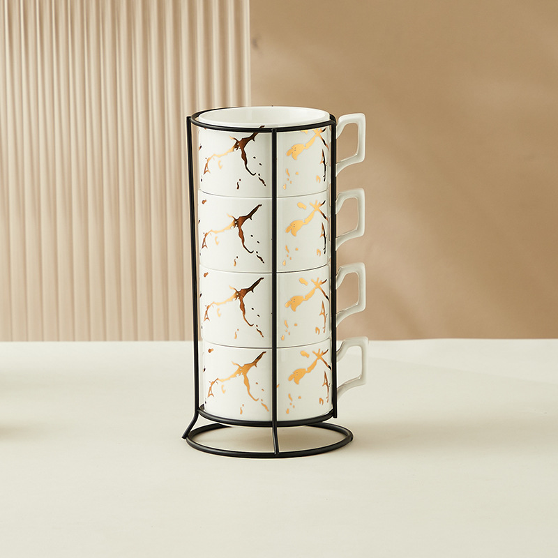Creativo dorado Taza de cerámica taza hogar tridimensional apilada taza de cuatro piezas con marco de hierro taza de agua de café