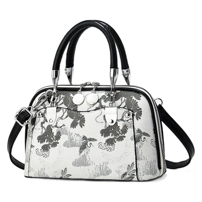 Fabricantes de bolsos de mujer bolsos de mano atmósfera textura bolsos de hombro de gran capacidad bolsos de mochilas bolsos de comercio exterior