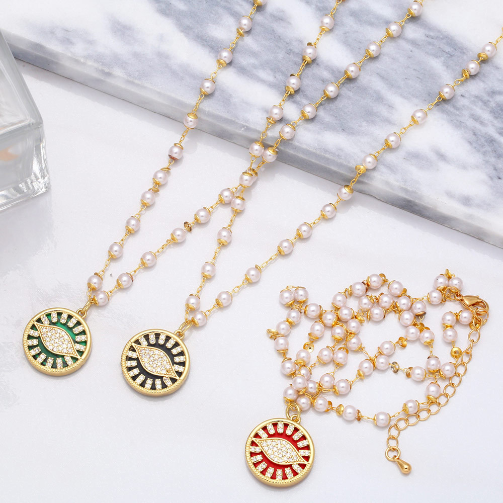 hip-hop retro pearl devilu0027s eye pendant copper zircon necklace female
