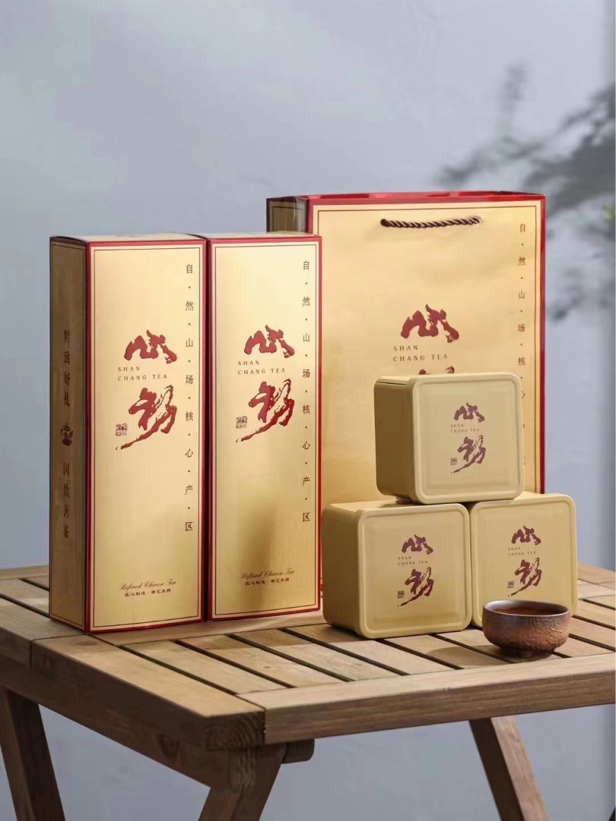 Caja de cigarrillos de hierro Guanyin 1 kg de carbón asado orquídea fragancia roja robe jinjun ceja pequeña variedad de té negro barato embalaje general