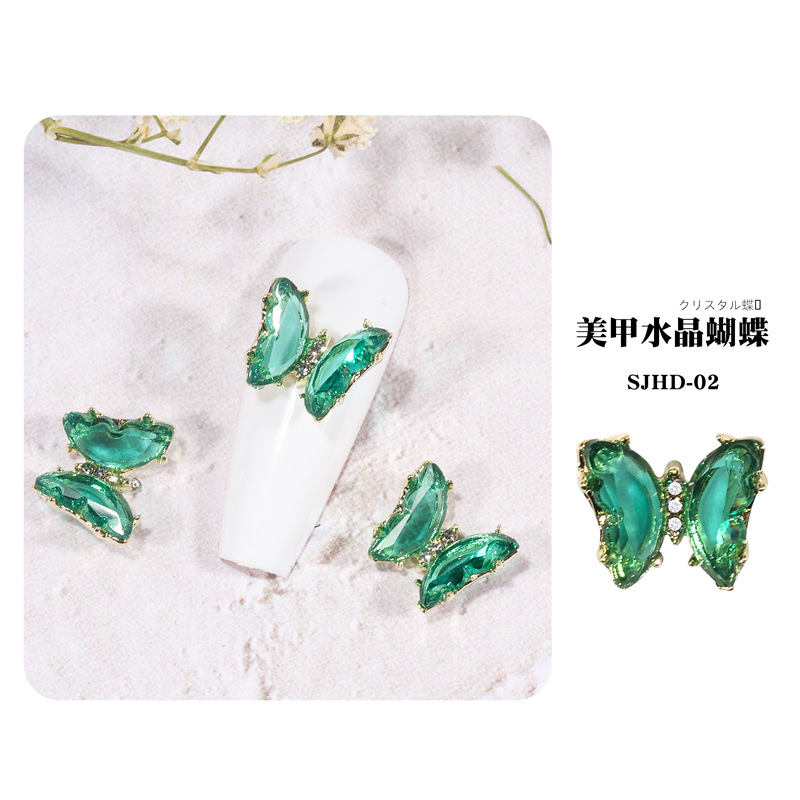 2021 nueva celebridad en línea belleza de uñas mariposa de cristal mágico estilo INS hielo tridimensional transparente Aurora diamante metal decoración de uñas