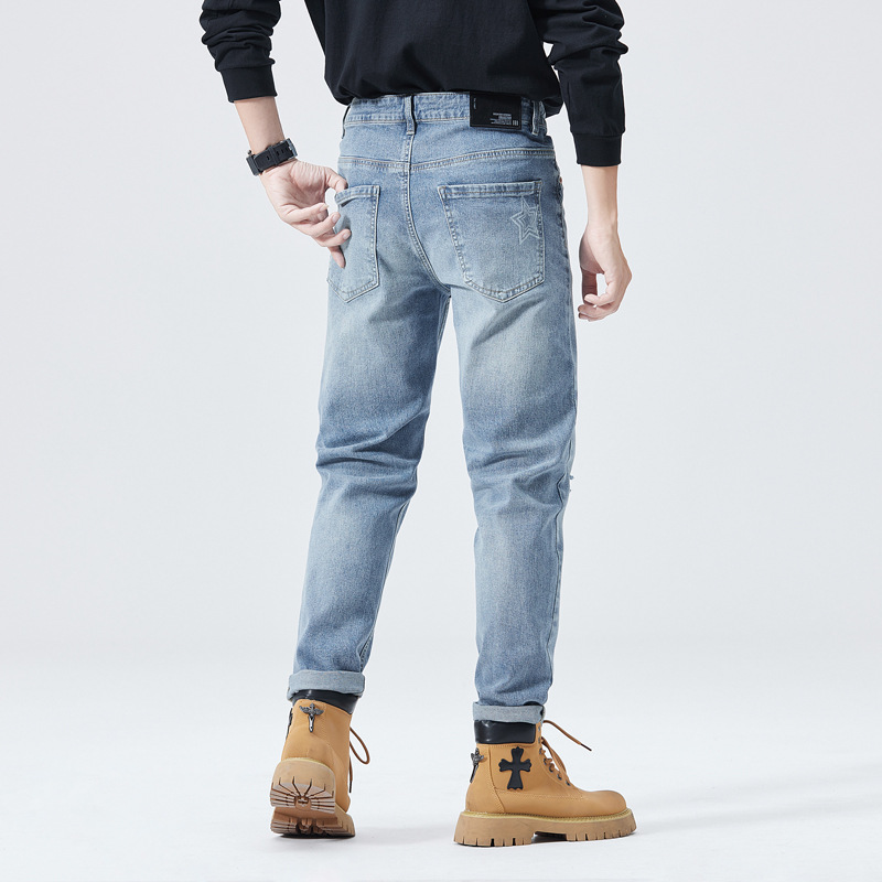 Otoño e invierno nuevo Xinjiang algodón rasgado pantalones hombres lavados resistentes al desgaste grandes vaqueros de la vaca marca de moda suave todo partido Pantalones rectos