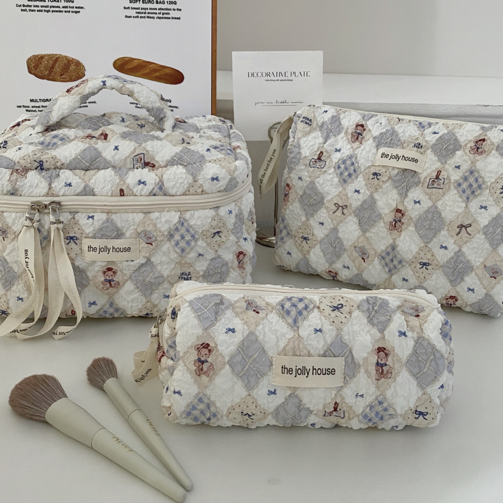 Versión coreana de la bolsa de cosméticos con lazo simple, bolsa de lavado de viaje portátil de gran capacidad, bolsa de almacenamiento de cosméticos para niñas