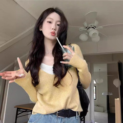 デザイン感vネックの偽の2つのニットセーターの女性の秋の服の韓国系の修身はやせています。