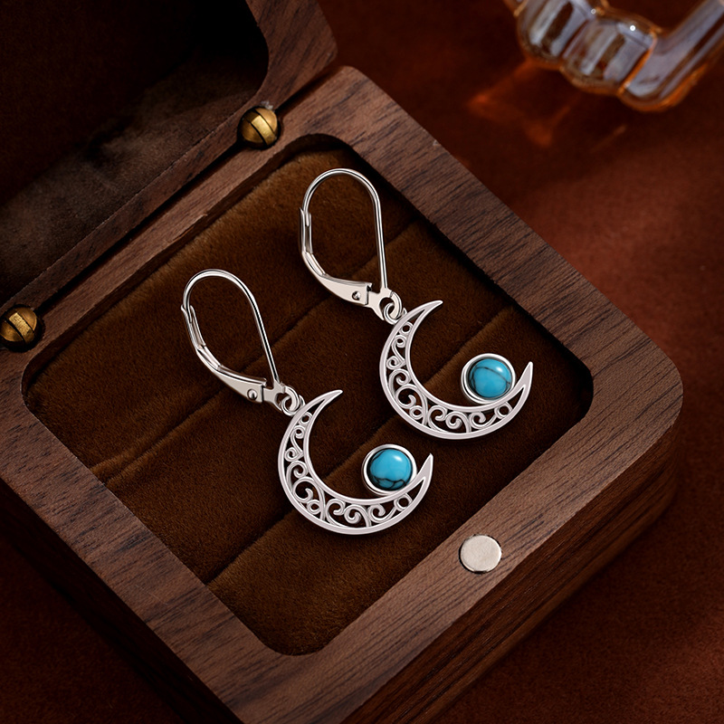 Europa y los Estados Unidos transfronterizos 925 plata esterlina turquesa pendientes de lujo ligero de lujo alto sentido celta estrella de luna pendientes de orejas