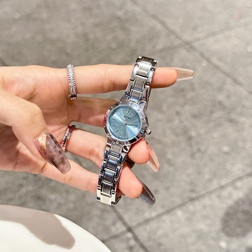 Aiqi's new student fashion temperament ladies watch commuter strap calendar niche light luxury casual steel strap quartz watch