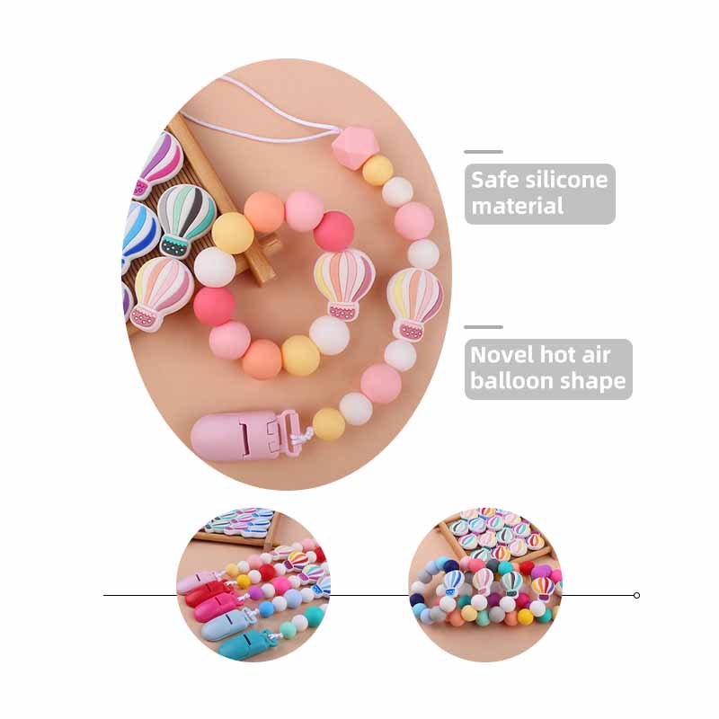 Nuevo bebé dibujos animados globo de aire caliente pulsera de silicona teether palo pezón cadena anti-gota cadena juguete teether