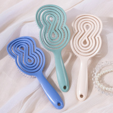 厂家供应新款头部按摩蚊香梳子 镂空卷发梳排骨顺发美发梳子现货