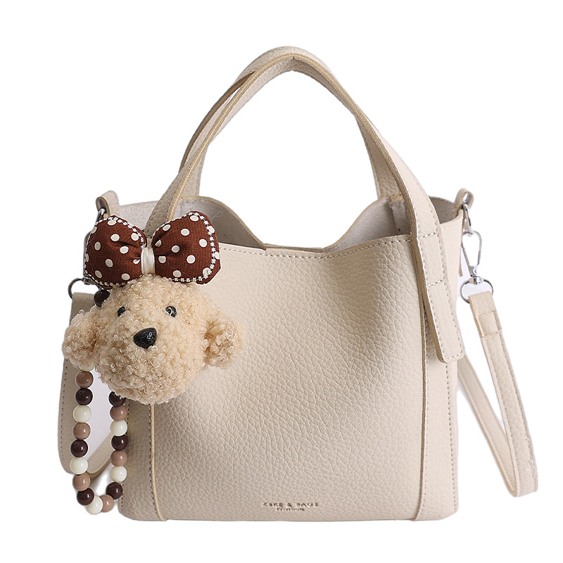 Nicho coreano litchi pattern bolso de cubo de mano mujer comercio exterior nueva moda alta textura ligera lujosa bolsa de mochila