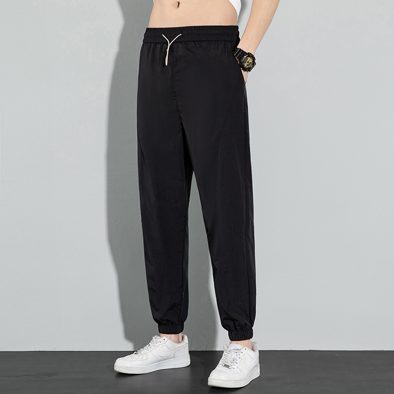 Pantalones de seda de hielo para hombres 2024 verano delgado suelto transpirable pantalones deportivos de secado rápido pantalones elásticos de pies de hielo casuales