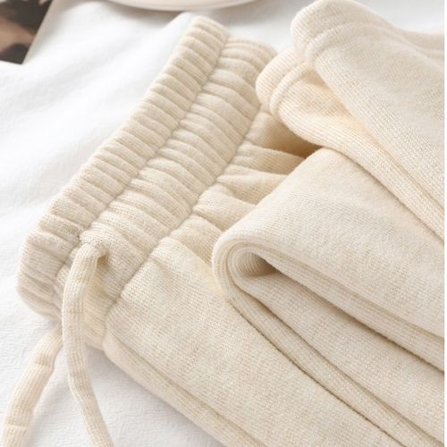 Soft, cozy, and stretchy spring/fall/winter pants made from premium cashmere—narrow-fit, straight-leg design with a graceful, flowing silhouette. Women's relaxed-style sweatpants.