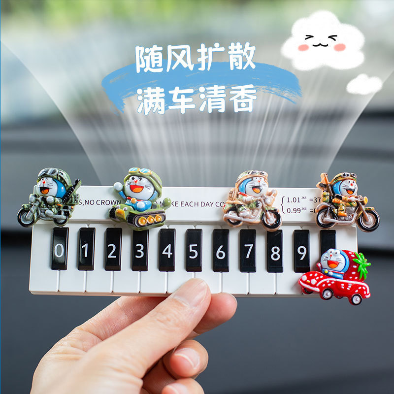 La placa de estacionamiento temporal del automóvil Dingdang Cat, la placa de teléfono móvil femenina, la placa de número del teléfono móvil del automóvil, puede ocultar los productos decorativos