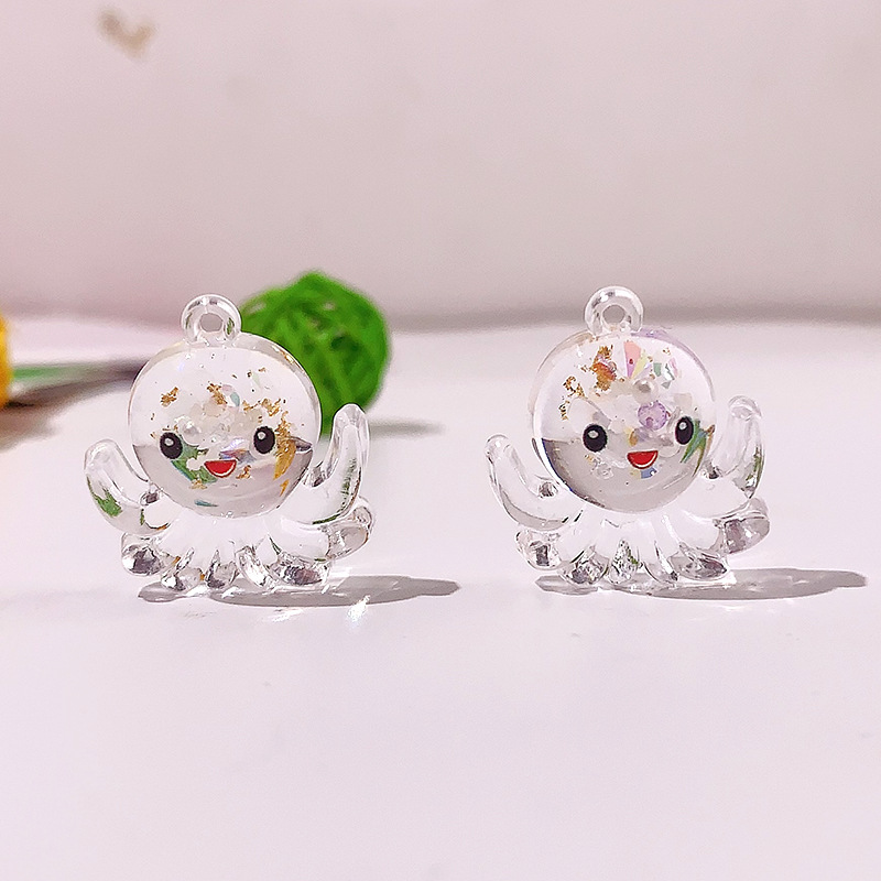 Nuevos accesorios de pulpo nocturno marino serie de cristal octopus llavero colgante DIY material pendiente
