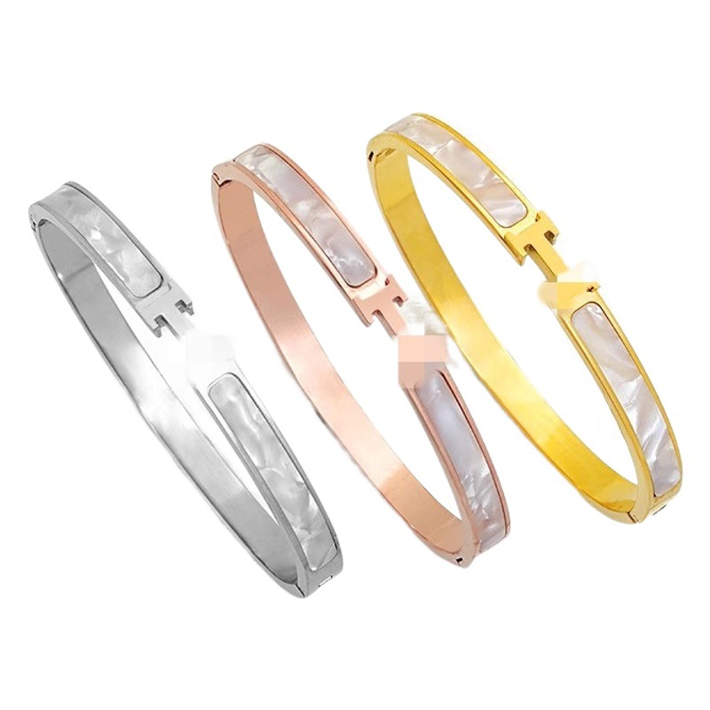 Pulsera de acero inoxidable mujer letra H joyería titanio acero no desvanecimiento venta al por mayor nueva pulsera simple oro plateado hebilla de apertura