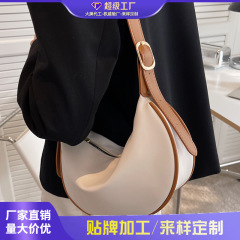 高級な質感の小さいカバンの女性の夏の2022新型のファッションのシングル肩の斜めのショルダーバッグの小さい大衆の設計のinsの鞍のカバン