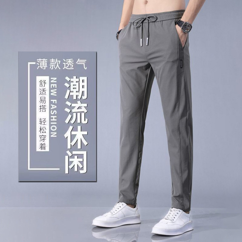 Pantalones casuales de los hombres rectos slim fit verano fino elástico cinturón elástico pantalones sueltos más tamaño entrega de una sola pieza