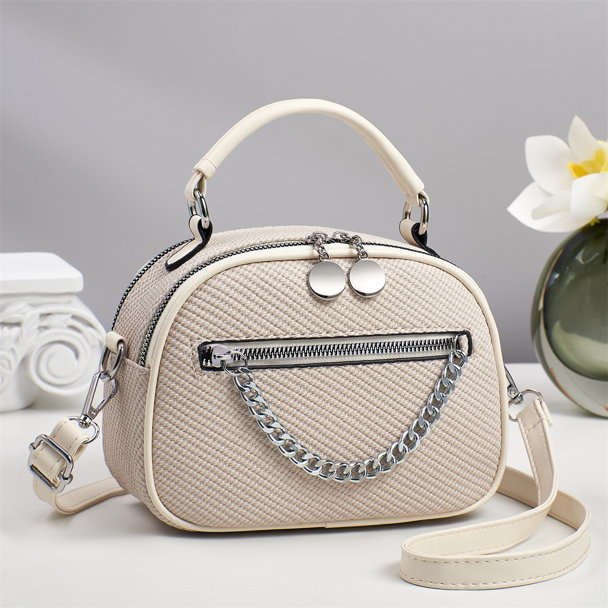 Nuevo estilo de lujo ligero patrón de serpiente moda todo-fósforo casual viajero portátil pequeño bolso redondo hombro diagonal bolso de mujer