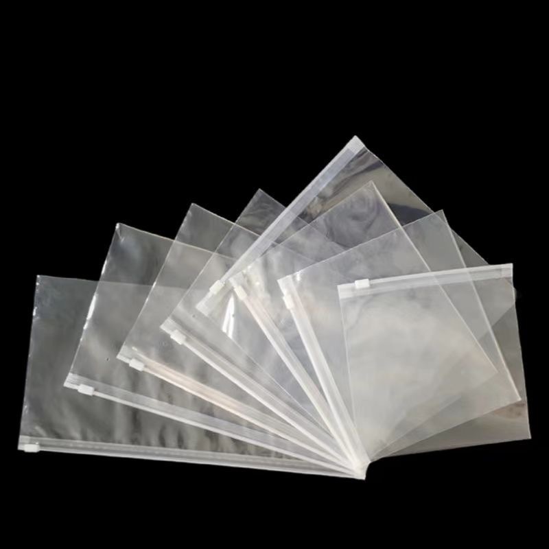 Bolsa de ropa transparente en stock calcetines gruesos bolsas de cremallera pantalones interiores personalizadas toallas pe bolsa de cremallera esmerizada