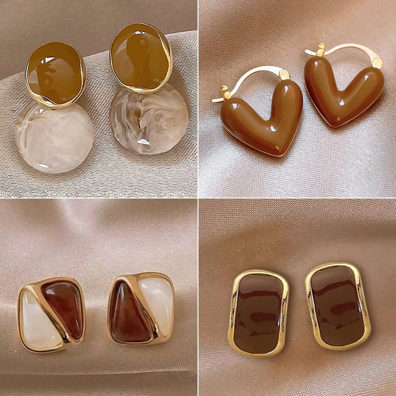 High-grade autumn and winter Maillard vintage drip earrings female 2024 popular earrings Internet celebrity round face slimming ear jewelry