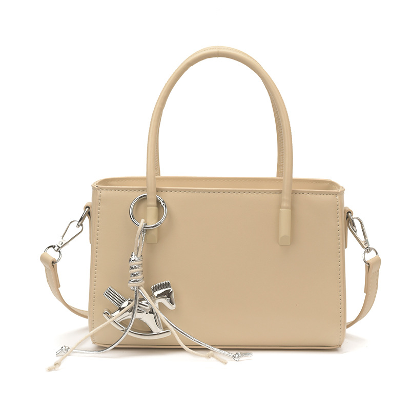 Diseño coreano de nicho bolso de mano casual para mujeres 2026 verano diario nuevo estilo de moda bolso de transporte