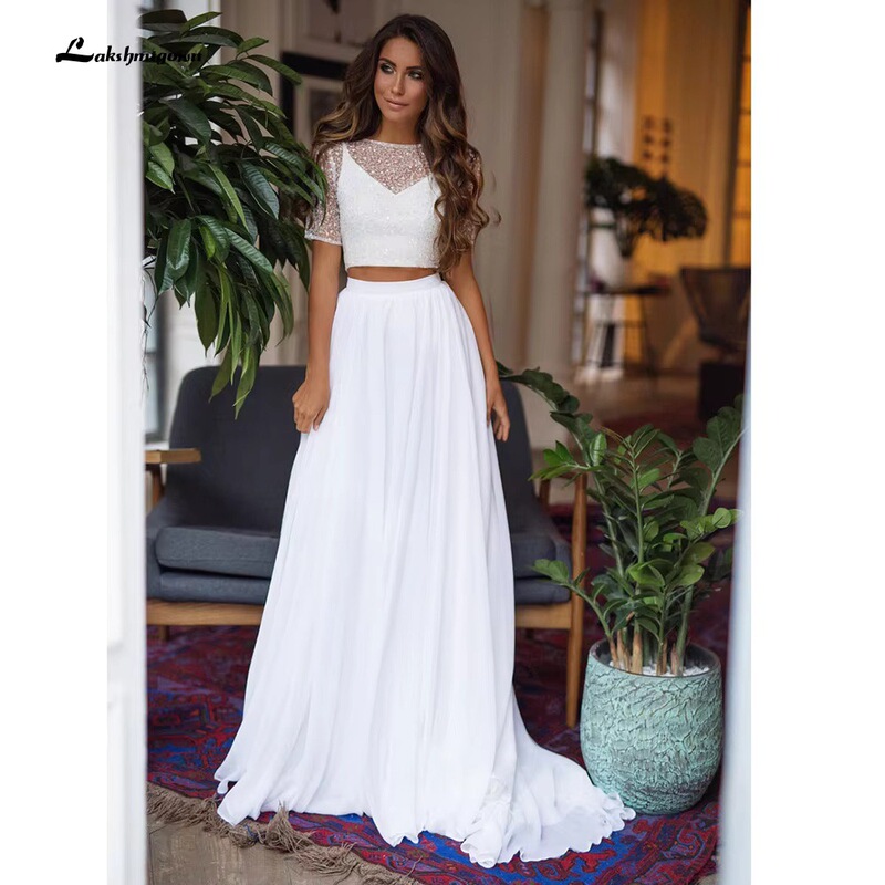 European and American two-piece lace wedding dress for women, waist-exposed A-line long style, for outdoor weddings European and American two-piece lace wedding dress for women, waist-exposed A-line long style, for outdoor weddings