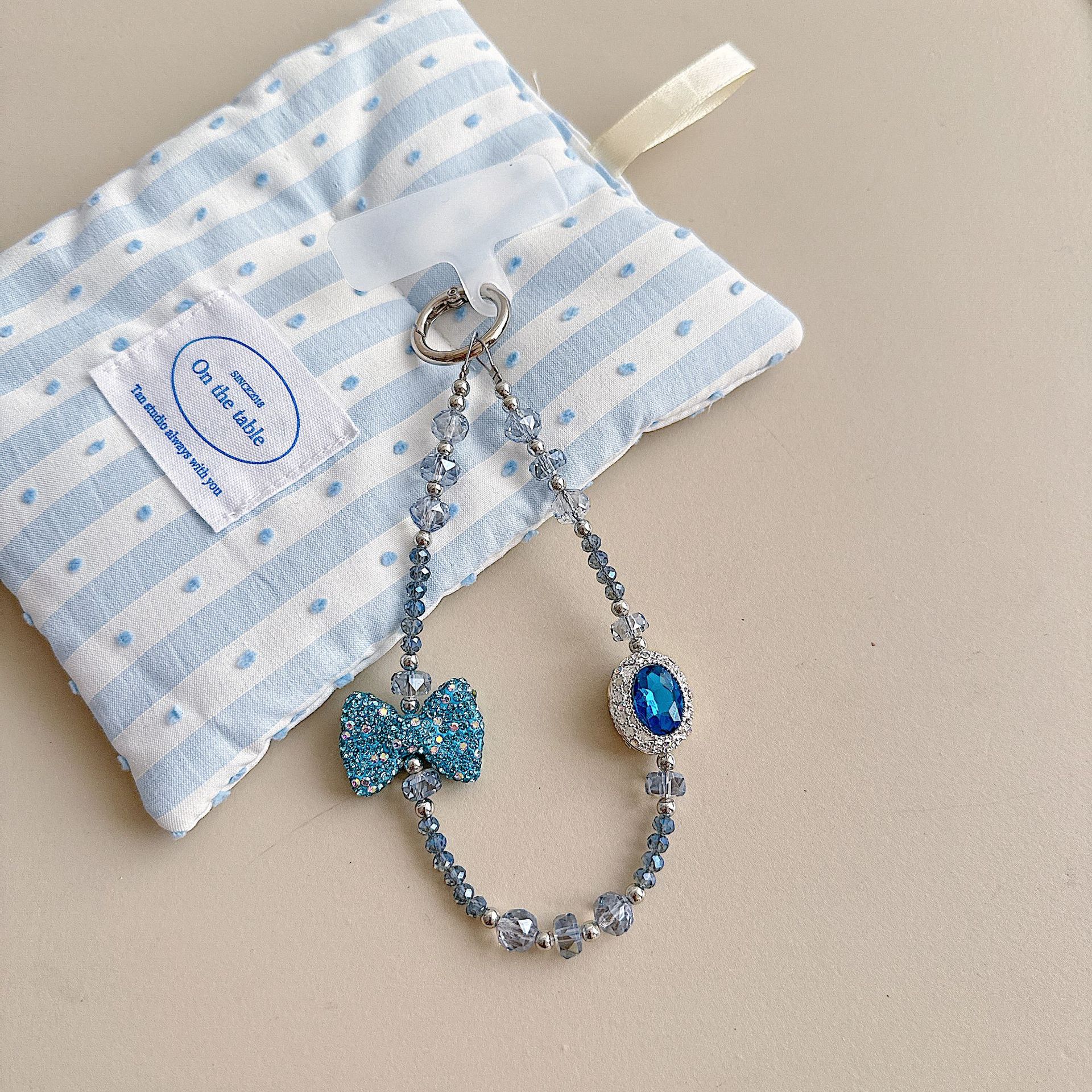 Boutique hecho a mano de alta gama teléfono móvil cadena colgante ins mujer ligero lujo dulce fresco estilo princesa moda teléfono móvil cadena colgante mensajero largo