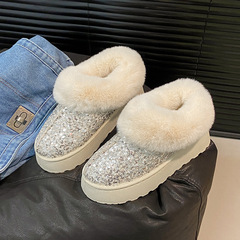 厚い底の保温の雪の靴の女性の2024冬の厚い保温のスパンコールの綿の靴の快適な外はカジュアルな毛羽立ちの靴を着ます。