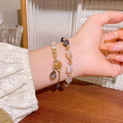 天然石真珠の二重ブレスレットをまねて、女性の贅沢な高級感があります。