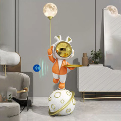 贅沢な宇宙飛行士のブルートゥースの音響は宇宙のウサギの客間のソファーのそばの創意灯の装飾品を飾って贈り物に移ります。