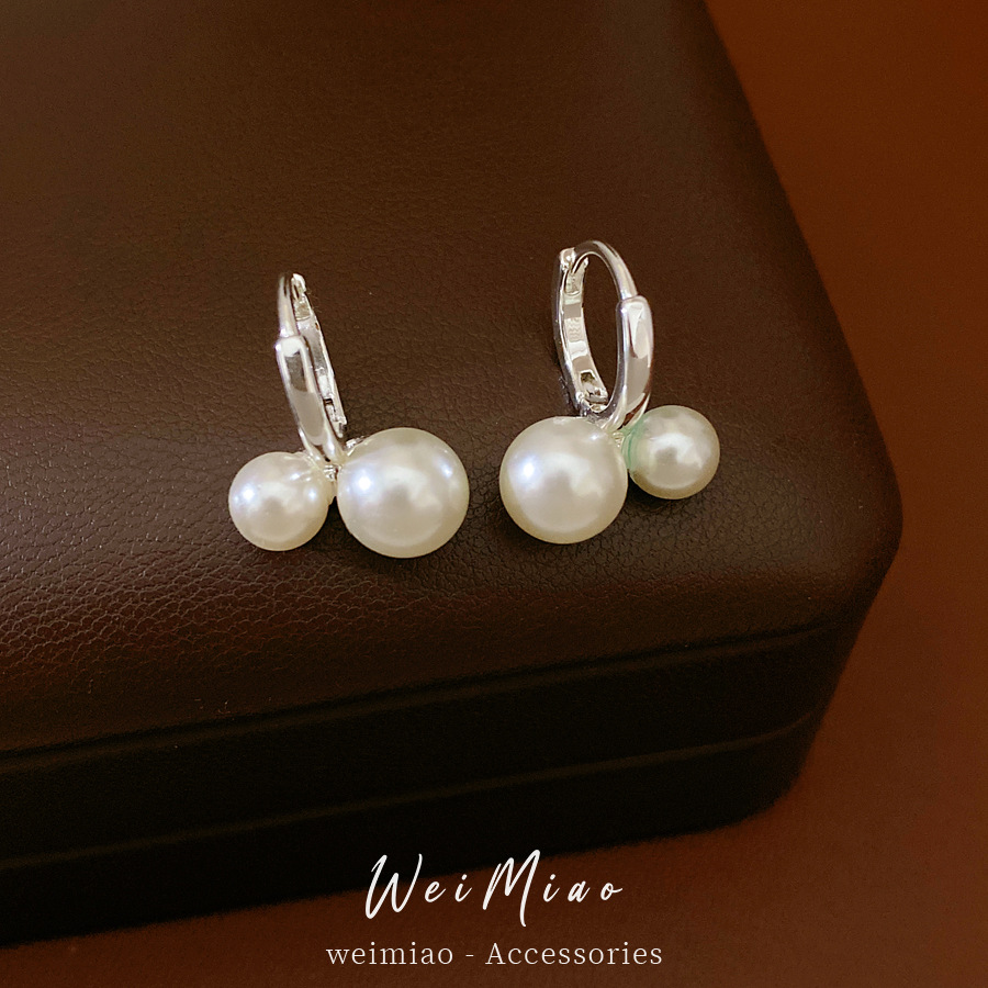 Elegante simple geometría perla aretes de perlas redondas temperamento frío aretes de aretes ligeros de lujo alta sensación de aretes al por mayor