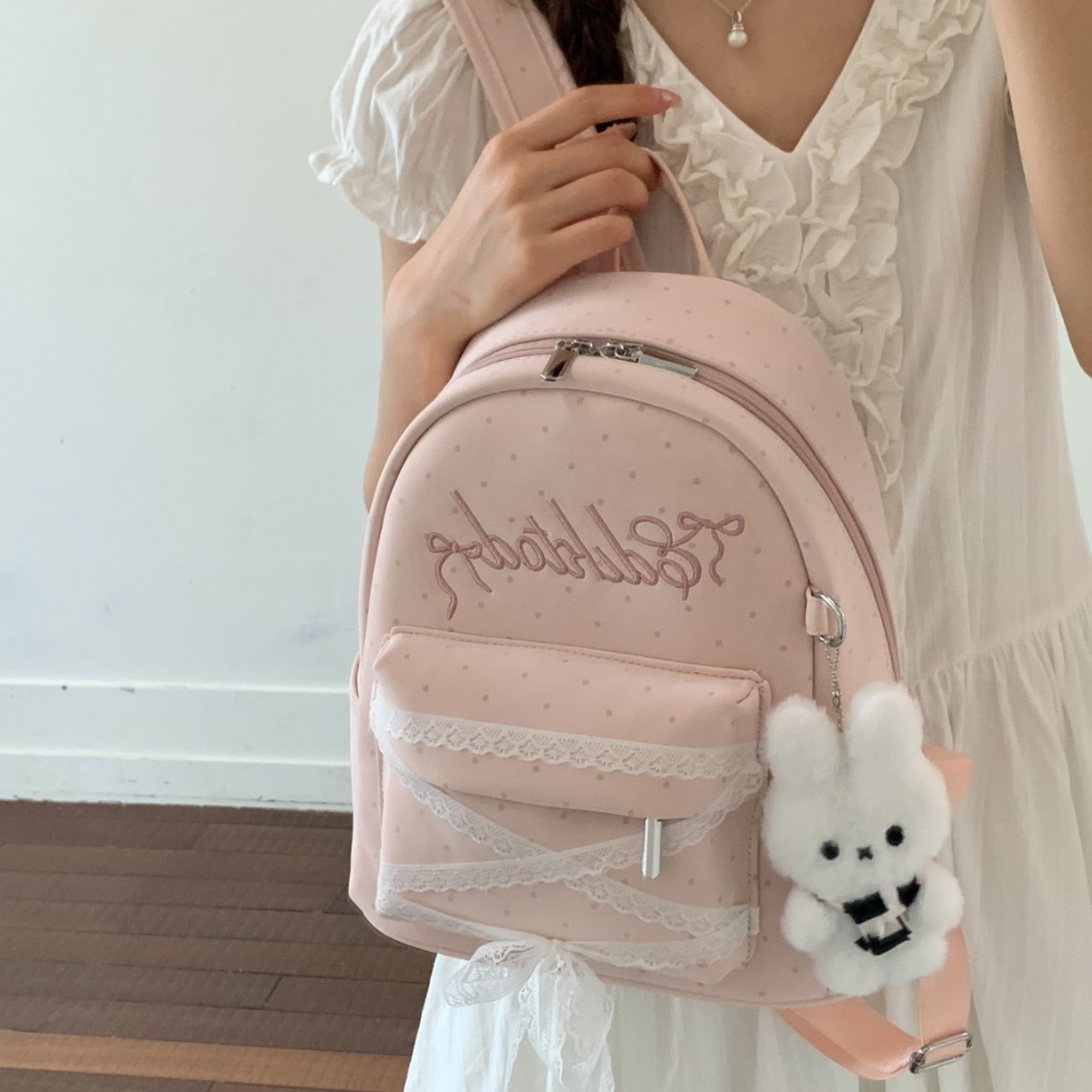 Mochila de letras onduladas para mujeres 2026 nuevo arco de encaje dulce mochila diaria mochila de verano ligera