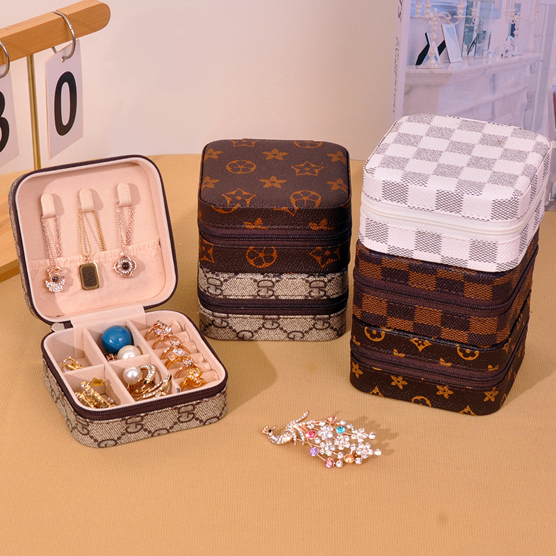 Pu caja de almacenamiento de joyería fabricantes de pendientes collares embalaje de joyería caja de almacenamiento anillo casero caja de joyería portátil