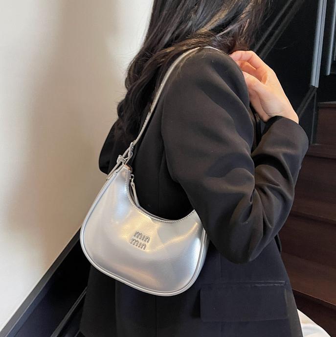 Bolsos de axila de nicho de moda para mujer 2025 nuevo bolso de bola de masa de cercanías con textura versátil, bolso de hombro de alta gama