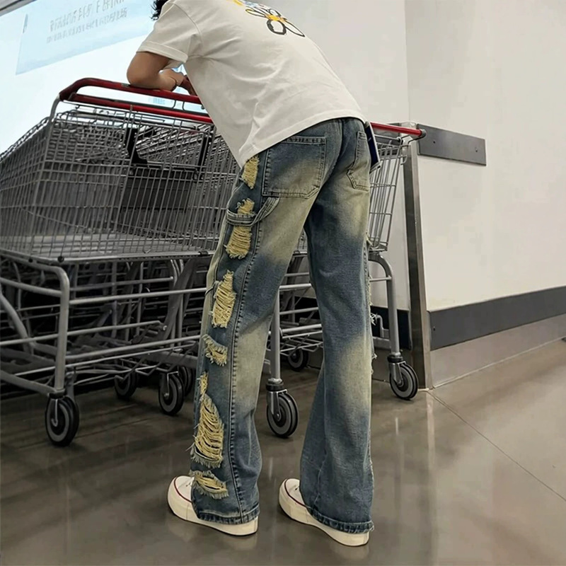 Street-style washed jeans with large side holes and a vintage look, summer wide-leg stylish and slimming distressed pants Street-style washed jeans with large side holes and a vintage look, summer wide-leg stylish and slimming distressed pants