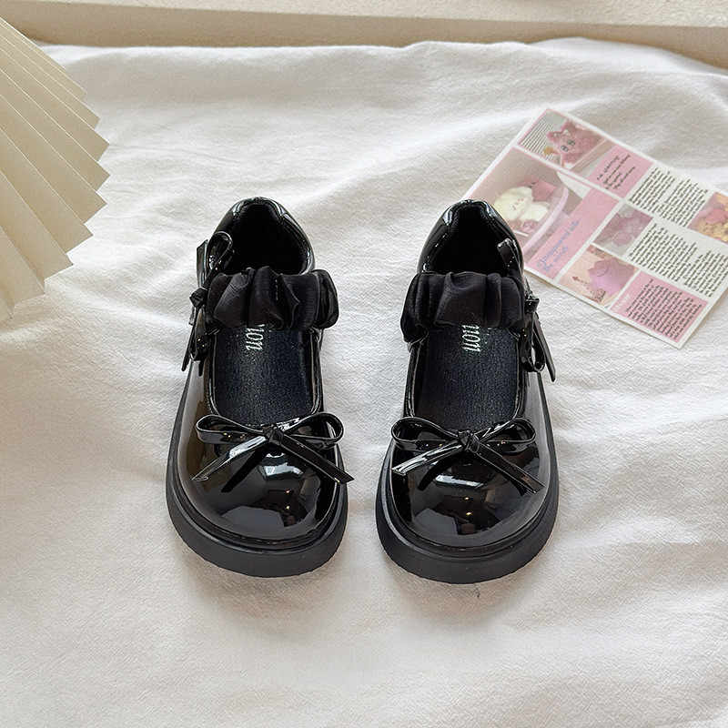 Zapatos de cuero de arco de niñas 2026 primavera y otoño nuevos zapatos casuales poco profundos Lefour estilo británico versátil zapatos Mary Jane