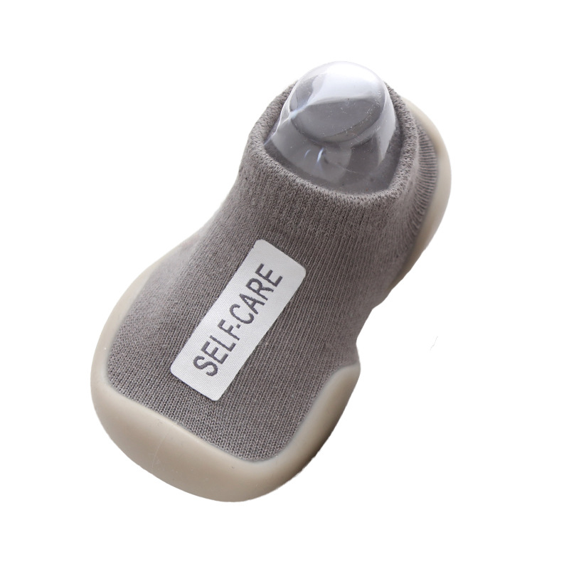 Primavera, verano y otoño calcetines de piso livianos para niños zapatos de bebé niño suela de goma tela de algodón impermeable zapatos y calcetines de educación temprana cortos estándar