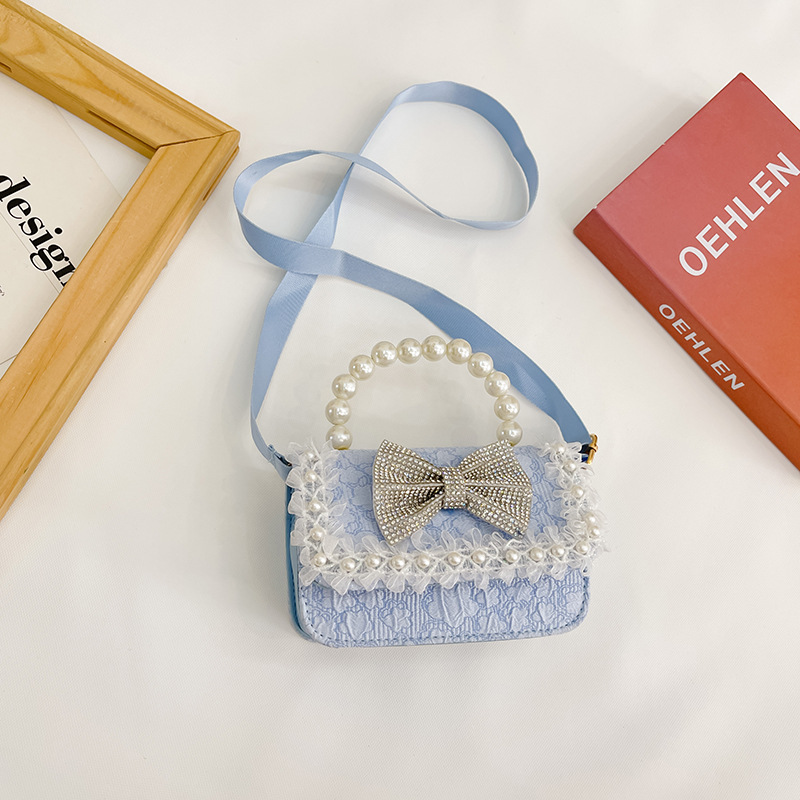 Bolsa de Niños de estilo coreano lindo arco perla Bolso pequeño princesa estilo occidental desgaste a juego joyería bolsa crossbody bolsa
