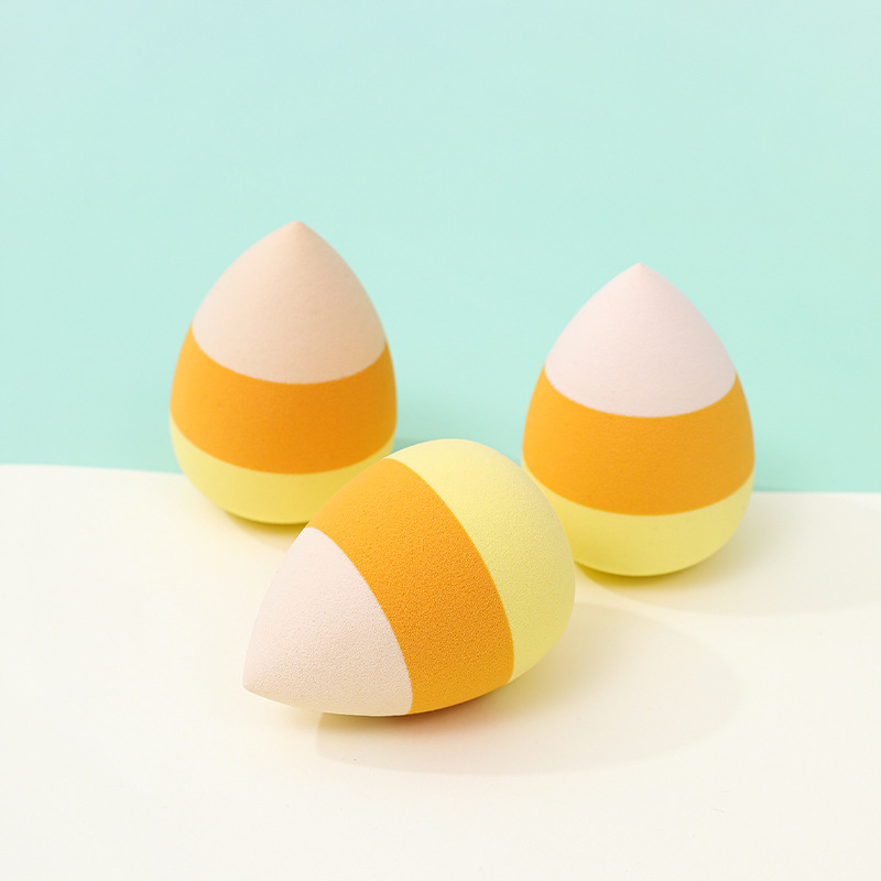 Customizado huevo de maquillaje de color mixto de tres colores polvo de maquillaje suave no comer polvo de maquillaje post de ropa de maquillaje esponja almohadilla de aire huevo de maquillaje