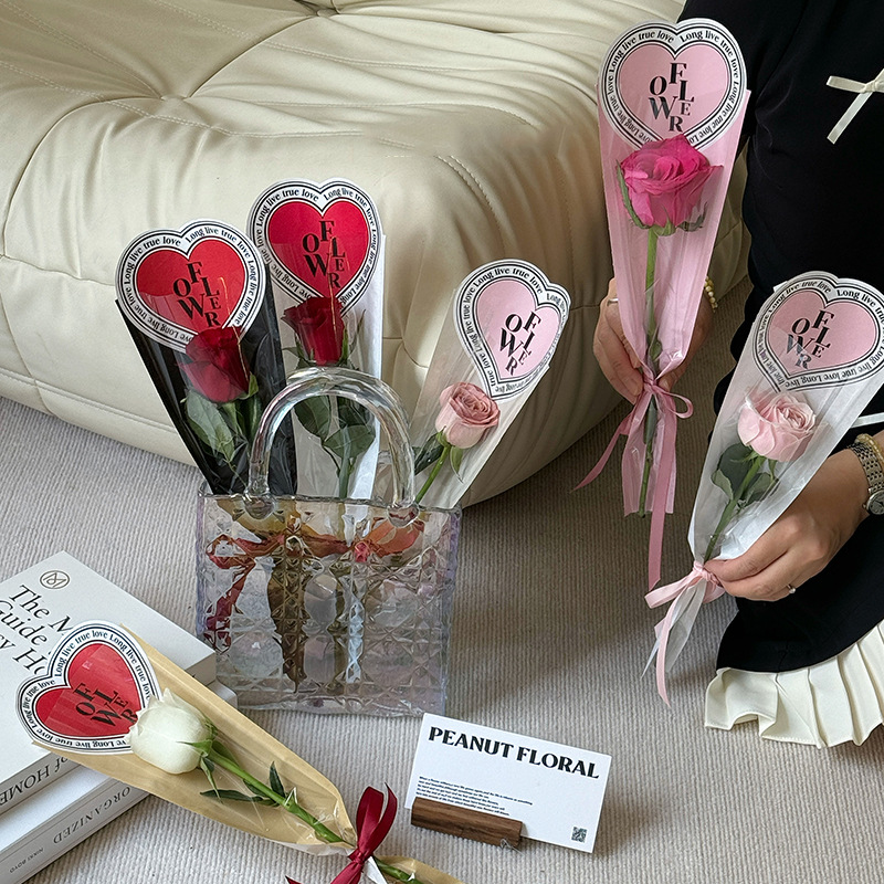 Huaxi día de San Valentín Crohe corazón una sola bolsa integral de papel de embalaje de flores bolsa de cuero transparente material floral