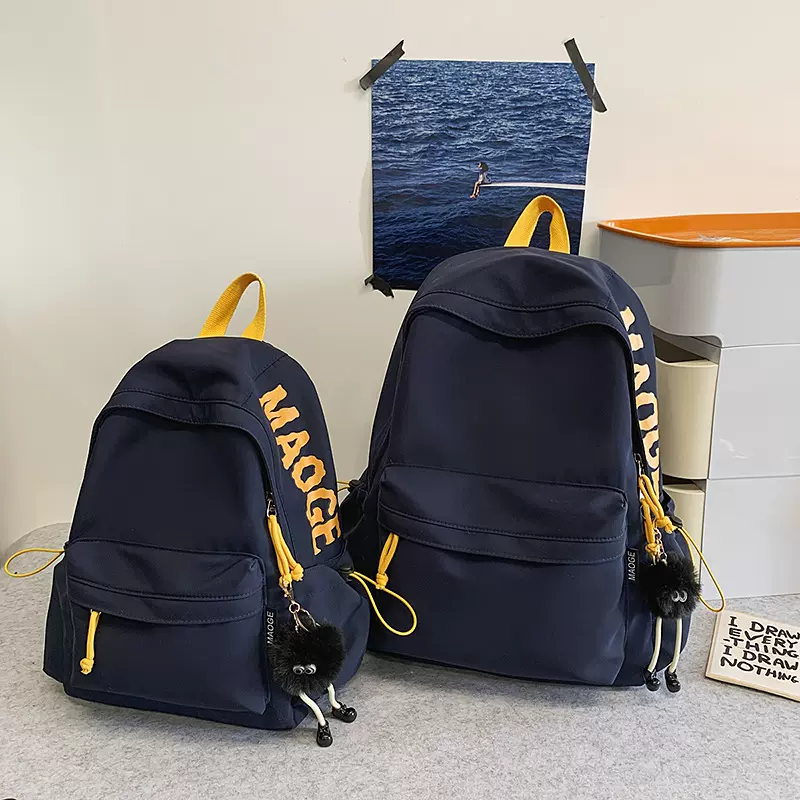 新款字母撞色轻便中学生书包高颜值男女同款大学生简约百搭双肩包