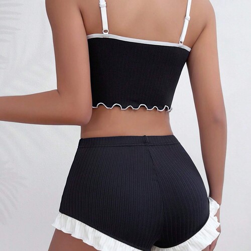 Hot-selling casual pajamas for women: lace V-neck camisole with ruffled shorts—comfortable loungewear.