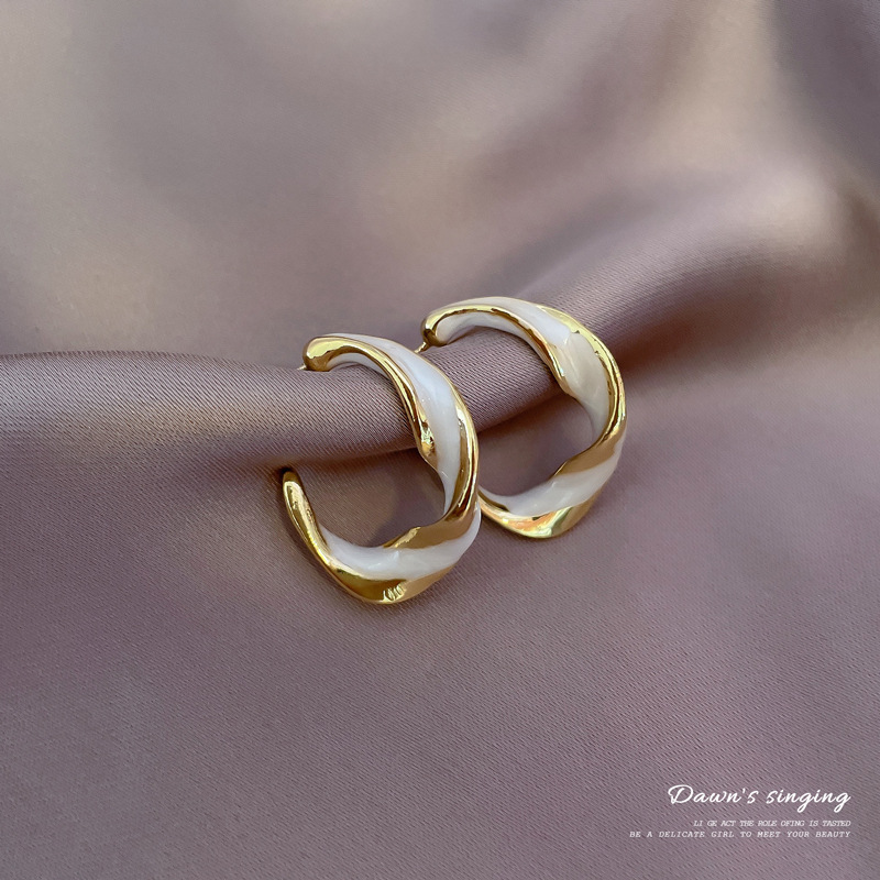 Korean New Retro Earrings Female Simple Personality Twisted Glaze Ring Earrings Wholesale display picture 6